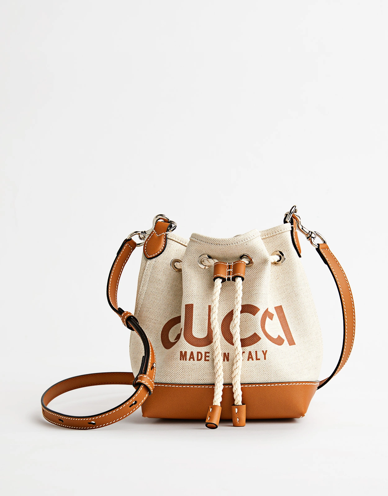Mini canvas printed crossbody bucket bag